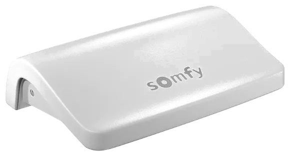 ソムフィ製 CONNEXOON Window RTS（コネクスーン）本体。白いなめらかな筐体にsomfyロゴ